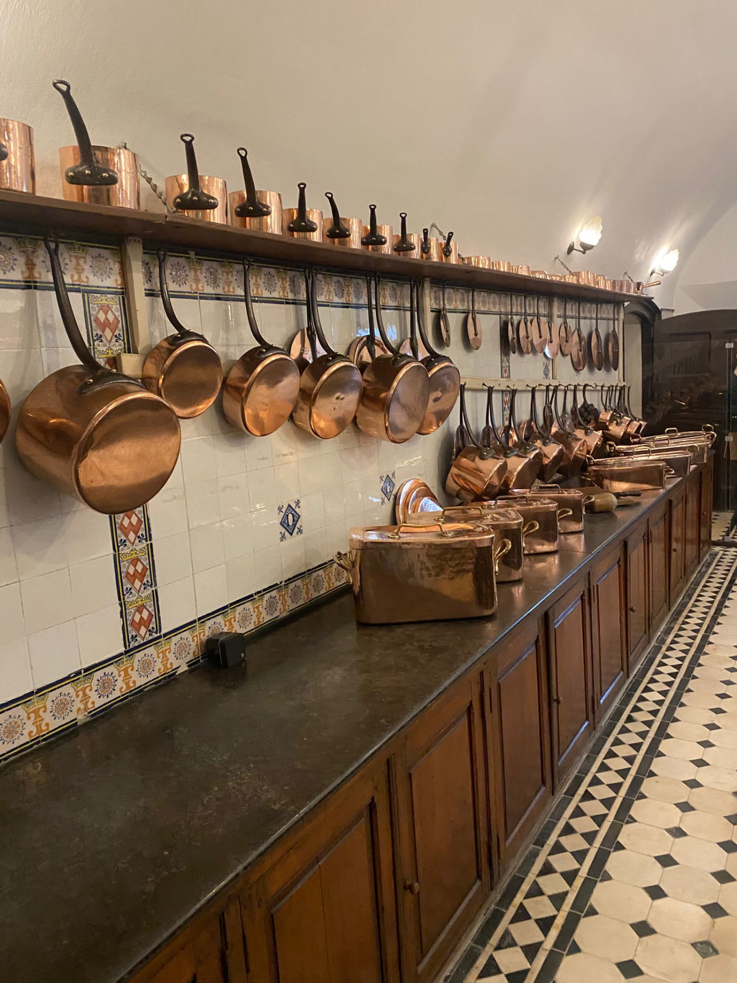 Historic kitchen with a collection of copper cookware